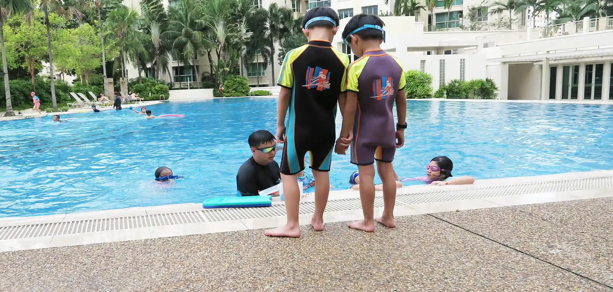 Friendly Dolphin Swim School swimming pool banner